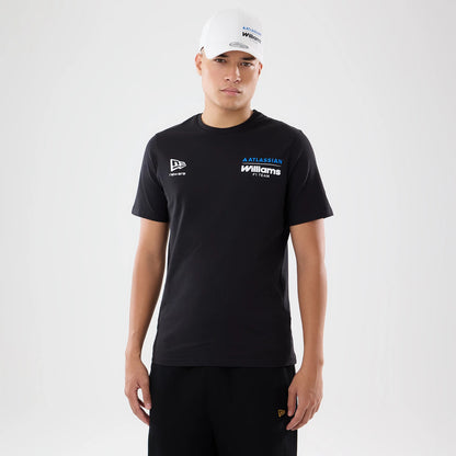 New Era Williams Carlos Sainz Spain Race Special Black T-Shirt, front view on-model displaying the New Era logo on the right chest, the Williams F1 Team logo embroidered on the left chest, and a matching cap with Atlassian branding.
