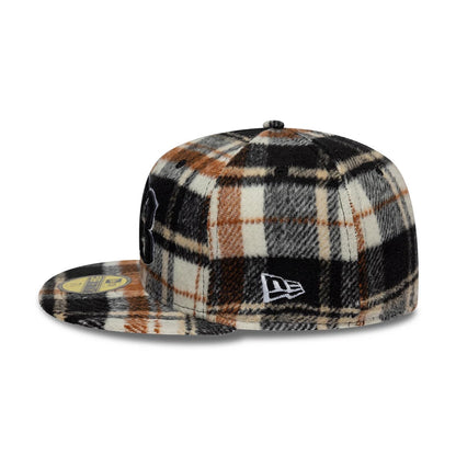 Pictured is this Kesi x New Era New Era 59FIFTY Fitted cap in black. 6