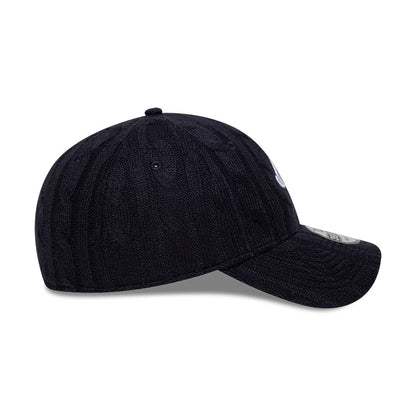Pictured is this New Era Knitted 39THIRTY Stretch Fit cap in navy. 7