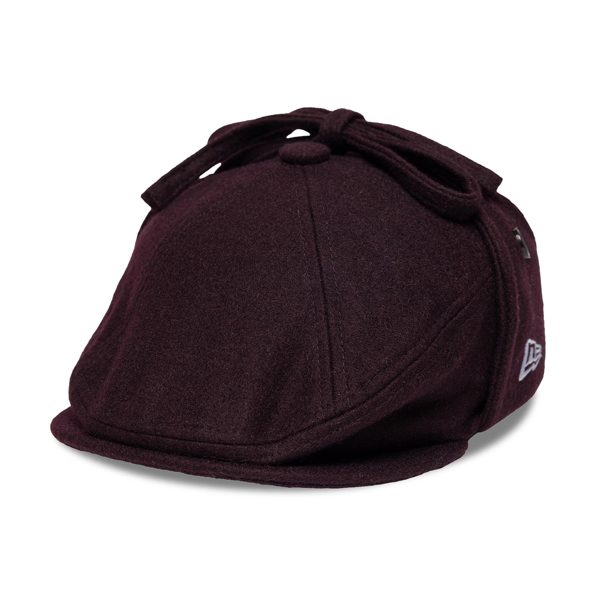 Pictured is this New Era Wool Downflap Driver cap in dark brown. 1