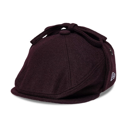 Pictured is this New Era Wool Downflap Driver cap in dark brown. 1