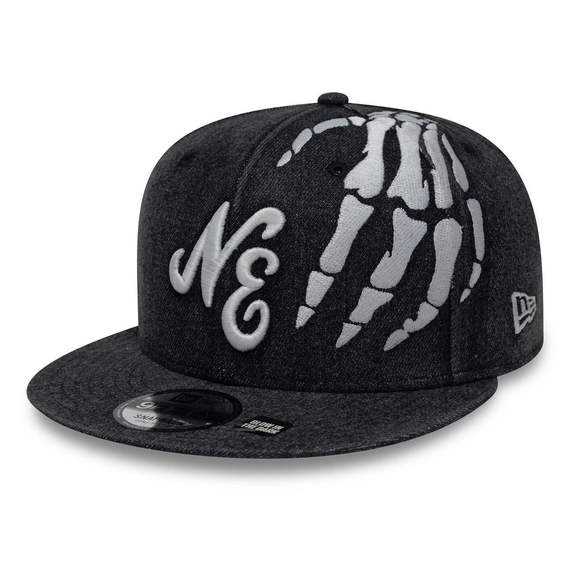 New Era Halloween Glow In The Dark Hands Black 9FIFTY Snapback Adjustable Cap, front view showing white embroidered NE letters on the front panel, a glow-in-the-dark skeletal hand pattern on the side, and a 9FIFTY size sticker on the grey flat visor.