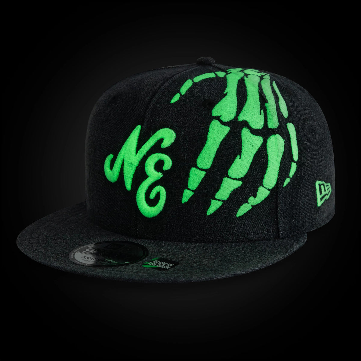 Pictured is this New Era Halloween Glow In The Dark Hands 9FIFTY Snapback cap in black. 2