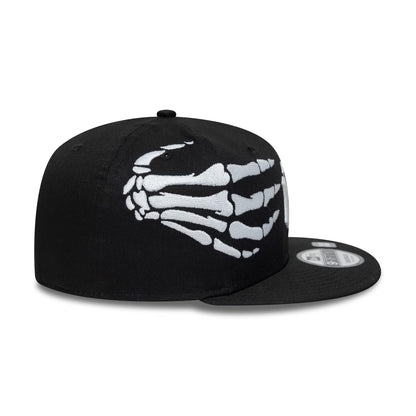 Pictured is this MLB Halloween Glow In The Dark Hands New York Yankees 9FIFTY Snapback cap in black. 7