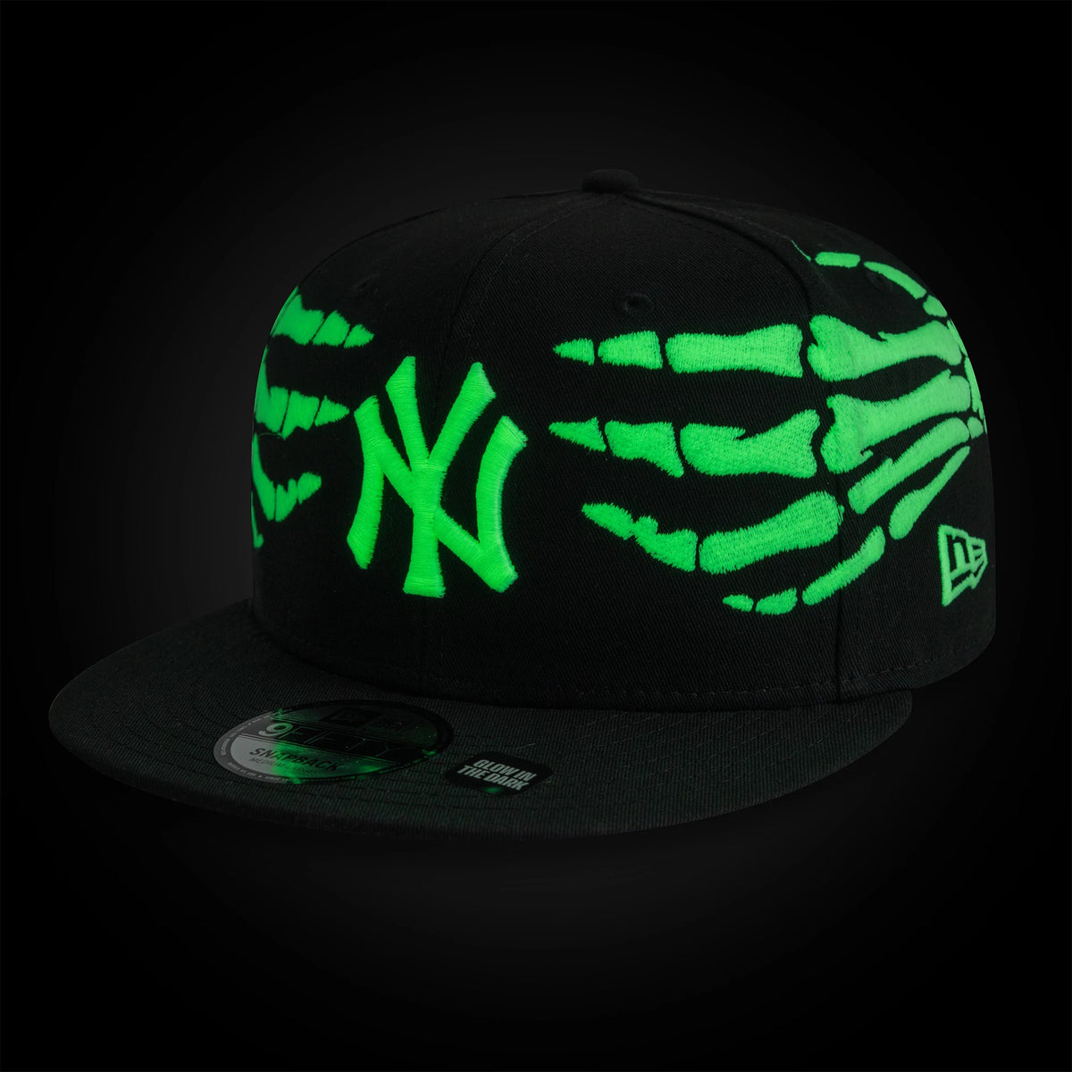 Pictured is this MLB Halloween Glow In The Dark Hands New York Yankees 9FIFTY Snapback cap in black. 2