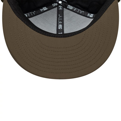 Pictured is this New Era Quilted Dogear 59FIFTY Fitted cap in Dark Green. 9