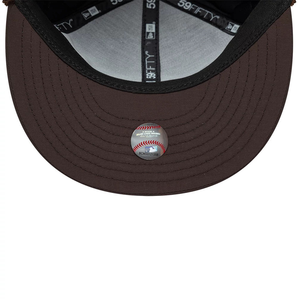 Pictured is this MLB Quilted Chicago White Sox Dogear 59FIFTY Fitted cap in dark brown. 9