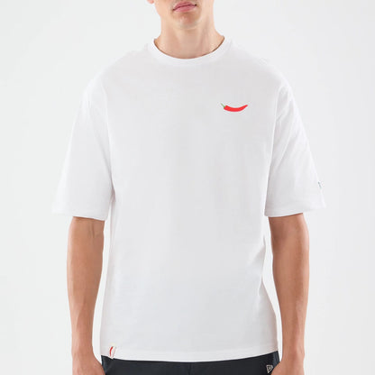 The model is wearing this Carlos Sainz Team Fifty5 Oversized T-Shirt in white. 3