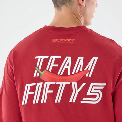 The model is wearing this Carlos Sainz Team Fifty5 Madrid Oversized T-Shirt in dark red. 7