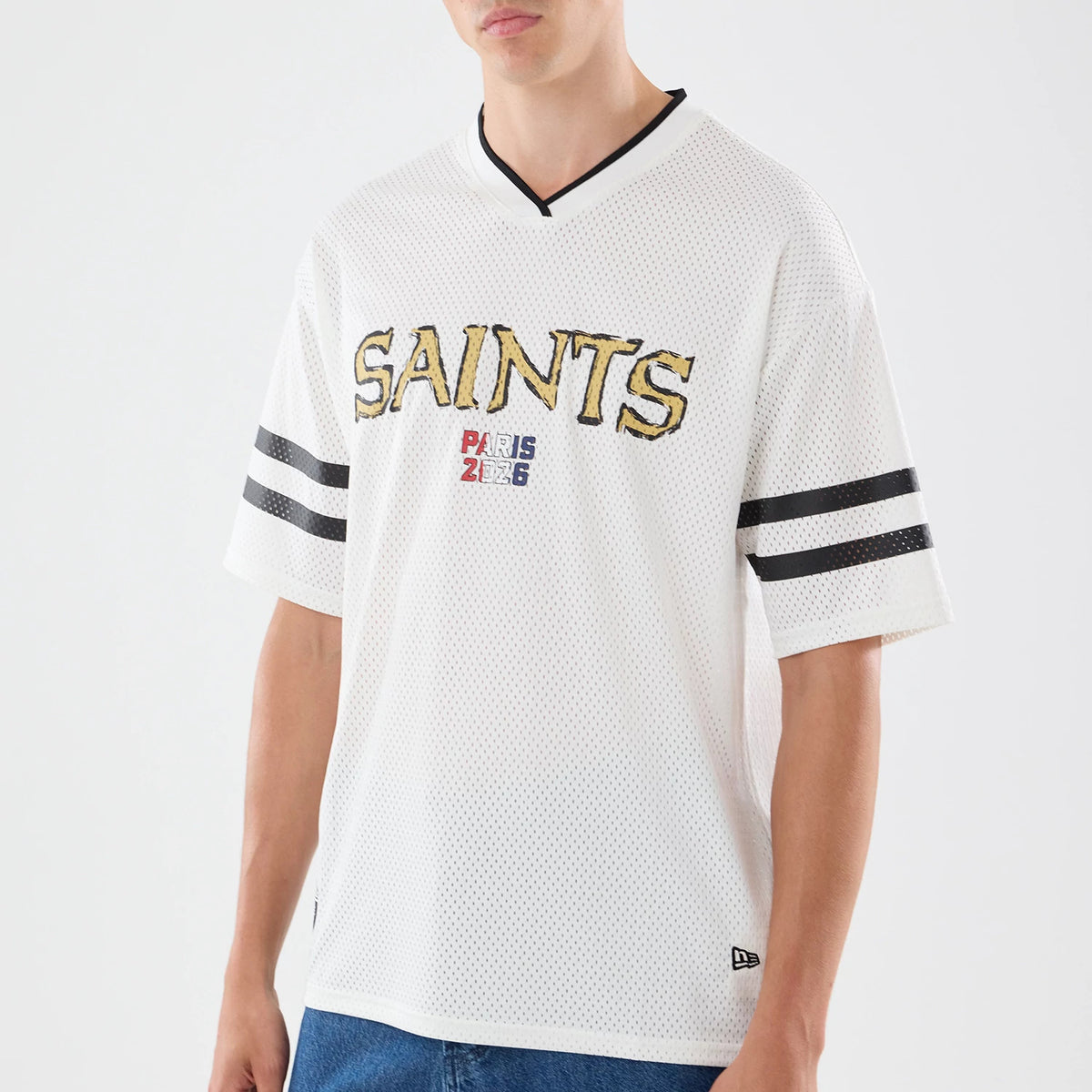 The model is wearing this NFL International Series Games 2026 Graphic New Orleans Saints Mesh Jersey in white. 5