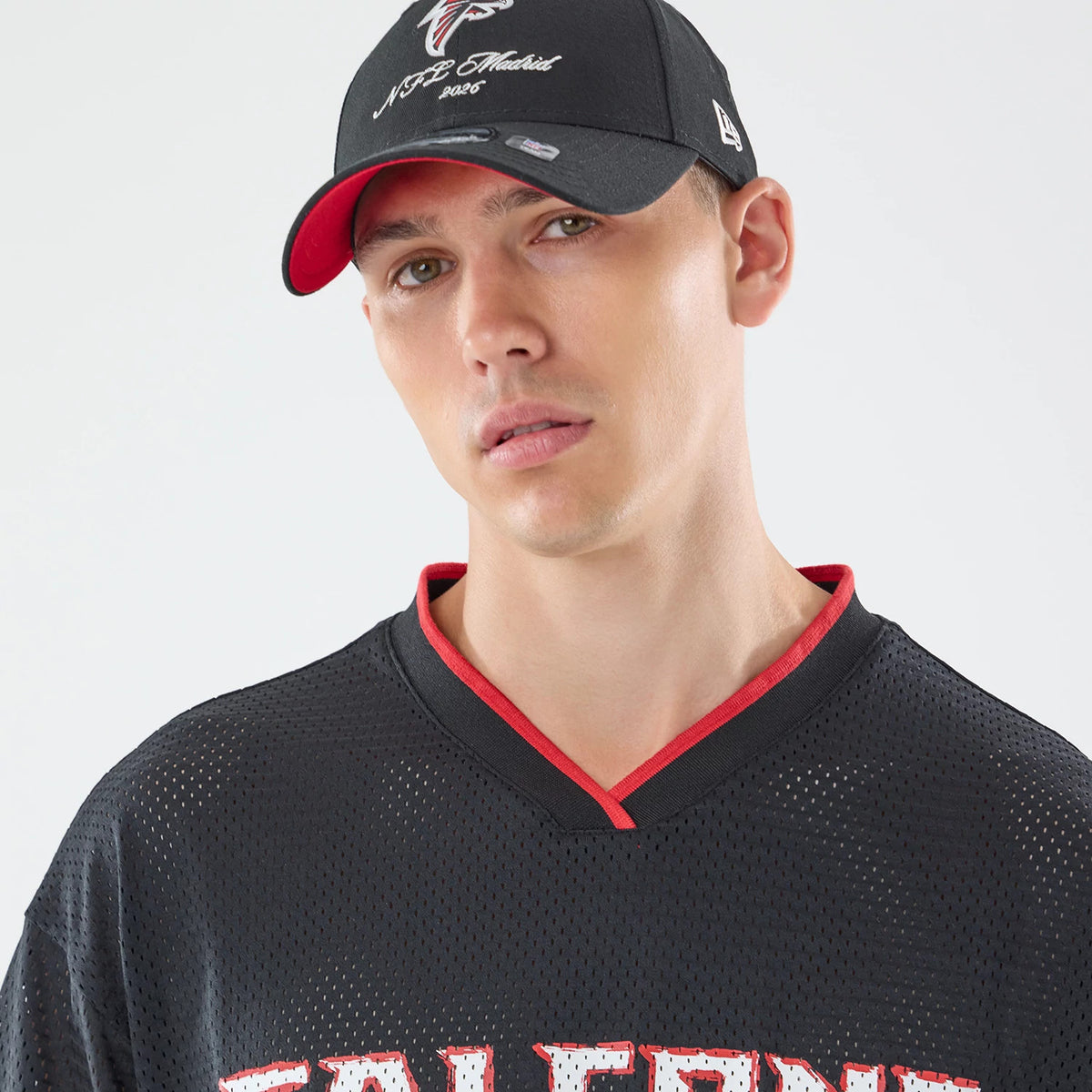 The model is wearing this NFL International Series Games 2026 Graphic Atlanta Falcons Mesh Jersey in black. 6