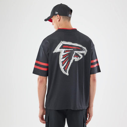 The model is wearing this NFL International Games 2026 Graphic Atlanta Falcons Mesh Jersey in black. 2