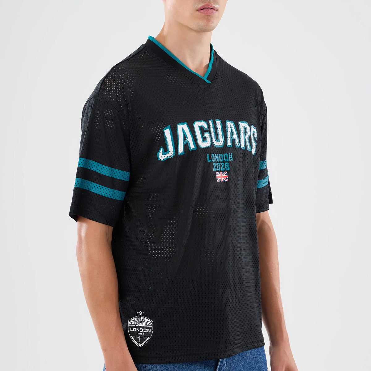 The model is wearing this NFL International Games 2026 Graphic Jacksonville Jaguars Mesh Jersey in black. 3