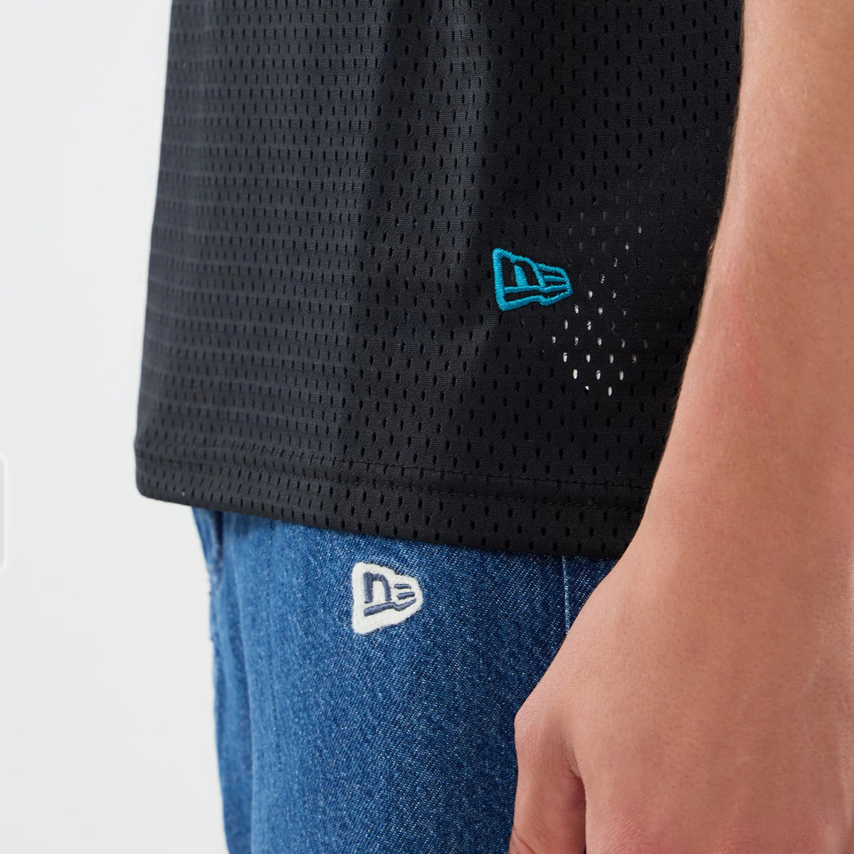 The model is wearing this NFL International Games 2026 Graphic Jacksonville Jaguars Mesh Jersey in black. 6