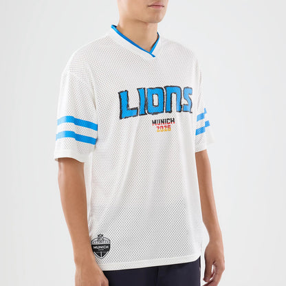 The model is wearing this NFL International Series Games 2026 Graphic Detroit Lions Mesh Jersey in white. 3