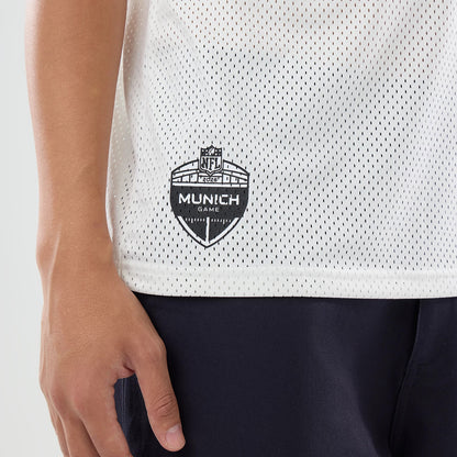 The model is wearing this NFL International Series Games 2026 Graphic Detroit Lions Mesh Jersey in white. 4