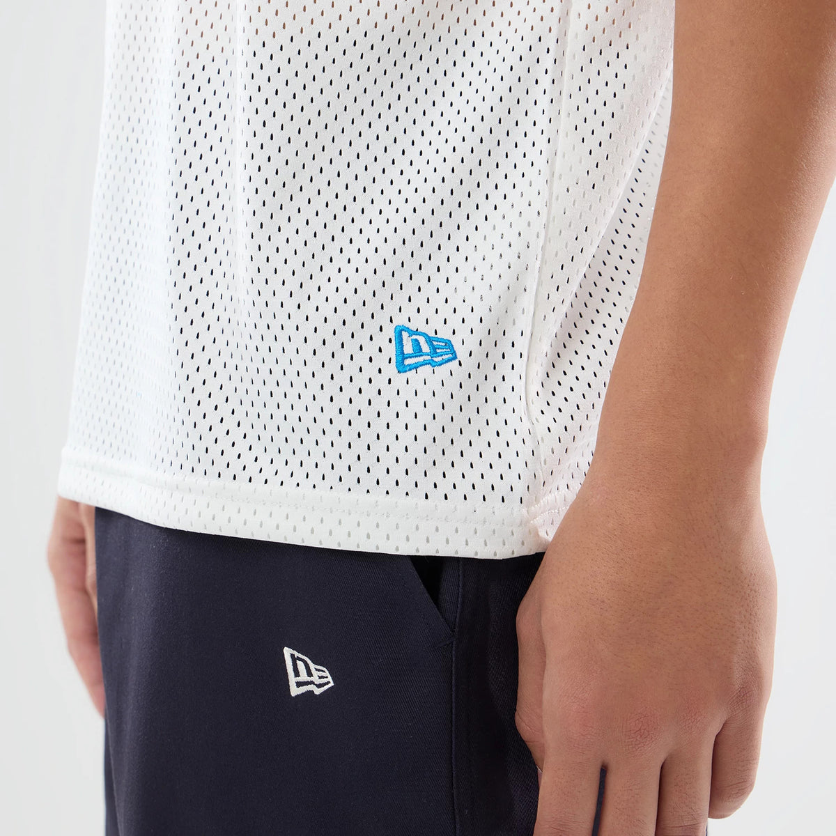 The model is wearing this NFL International Series Games 2026 Graphic Detroit Lions Mesh Jersey in white. 5