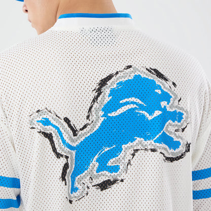 The model is wearing this NFL International Series Games 2026 Graphic Detroit Lions Mesh Jersey in white. 7