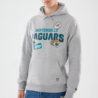 The model is wearing this NFL Patch Jacksonville Jaguars Pullover Hoodie in grey. 6