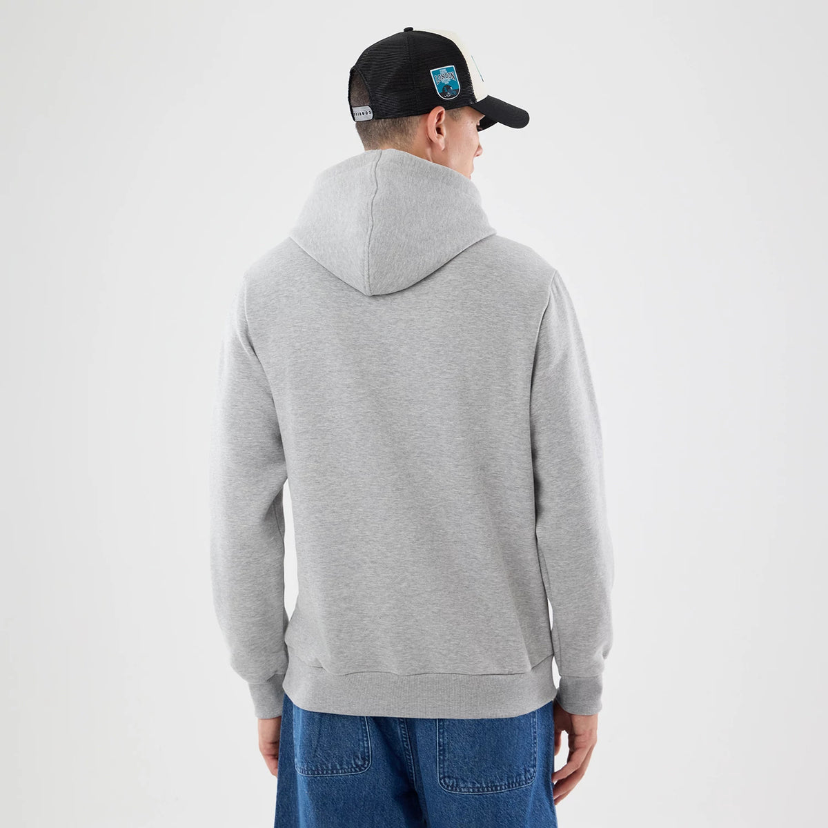 The model is wearing this NFL Patch Jacksonville Jaguars Pullover Hoodie in grey. 2