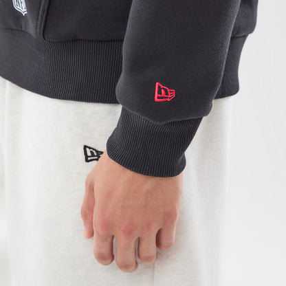 The model is wearing this NFL Patch Atlanta Falcons Pullover Hoodie in black. 5