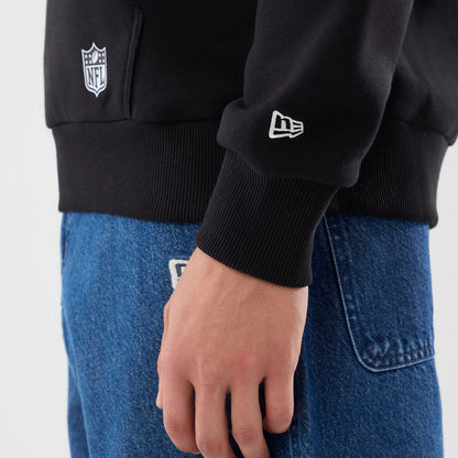 The model is wearing this NFL Patch New Orleans Saints Pullover Hoodie in black. 5
