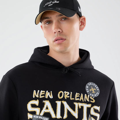 The model is wearing this NFL Patch New Orleans Saints Pullover Hoodie in black. 6