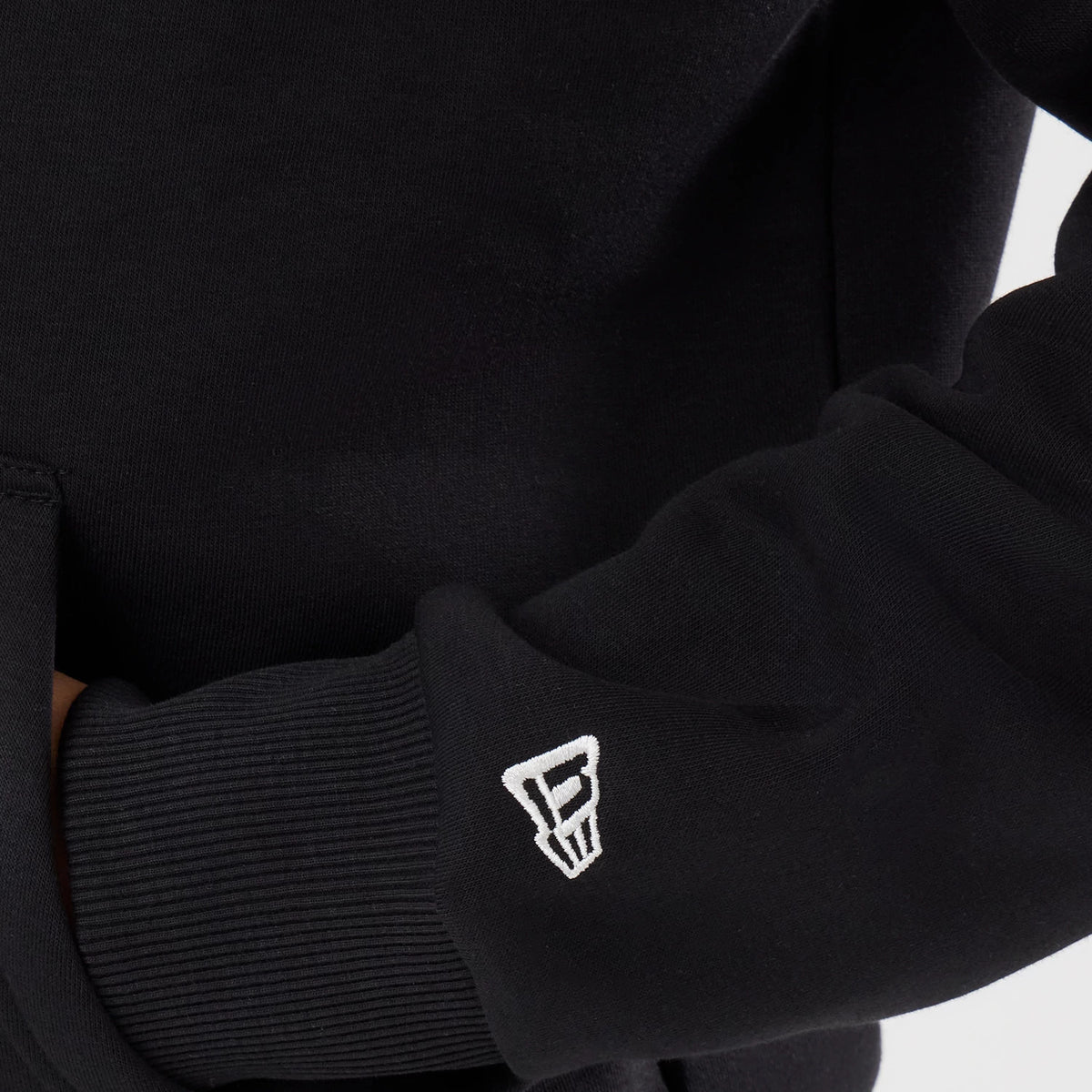 The model is wearing this NFL Patch Detroit Lions Pullover Hoodie in black. 5