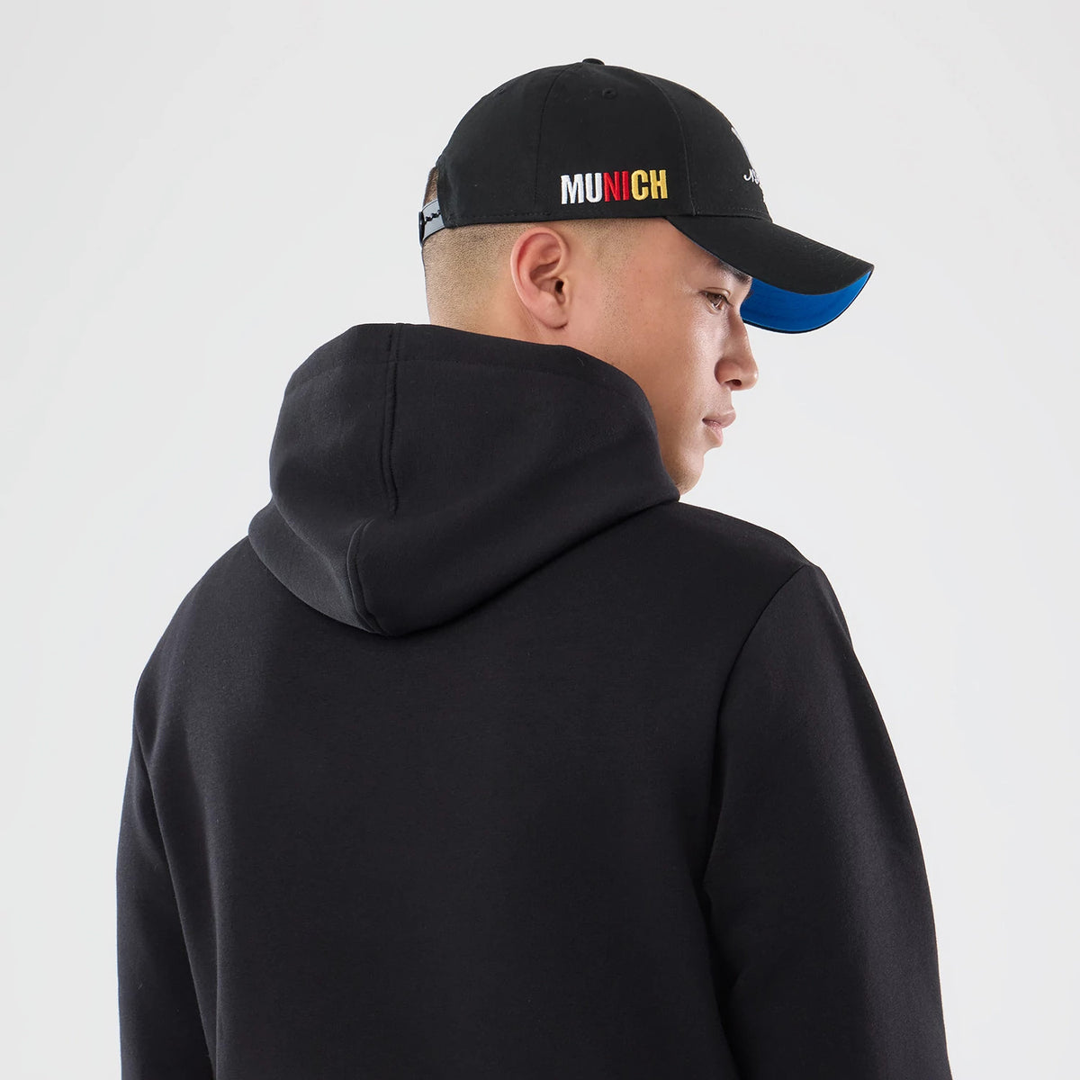 The model is wearing this NFL Patch Detroit Lions Pullover Hoodie in black. 7