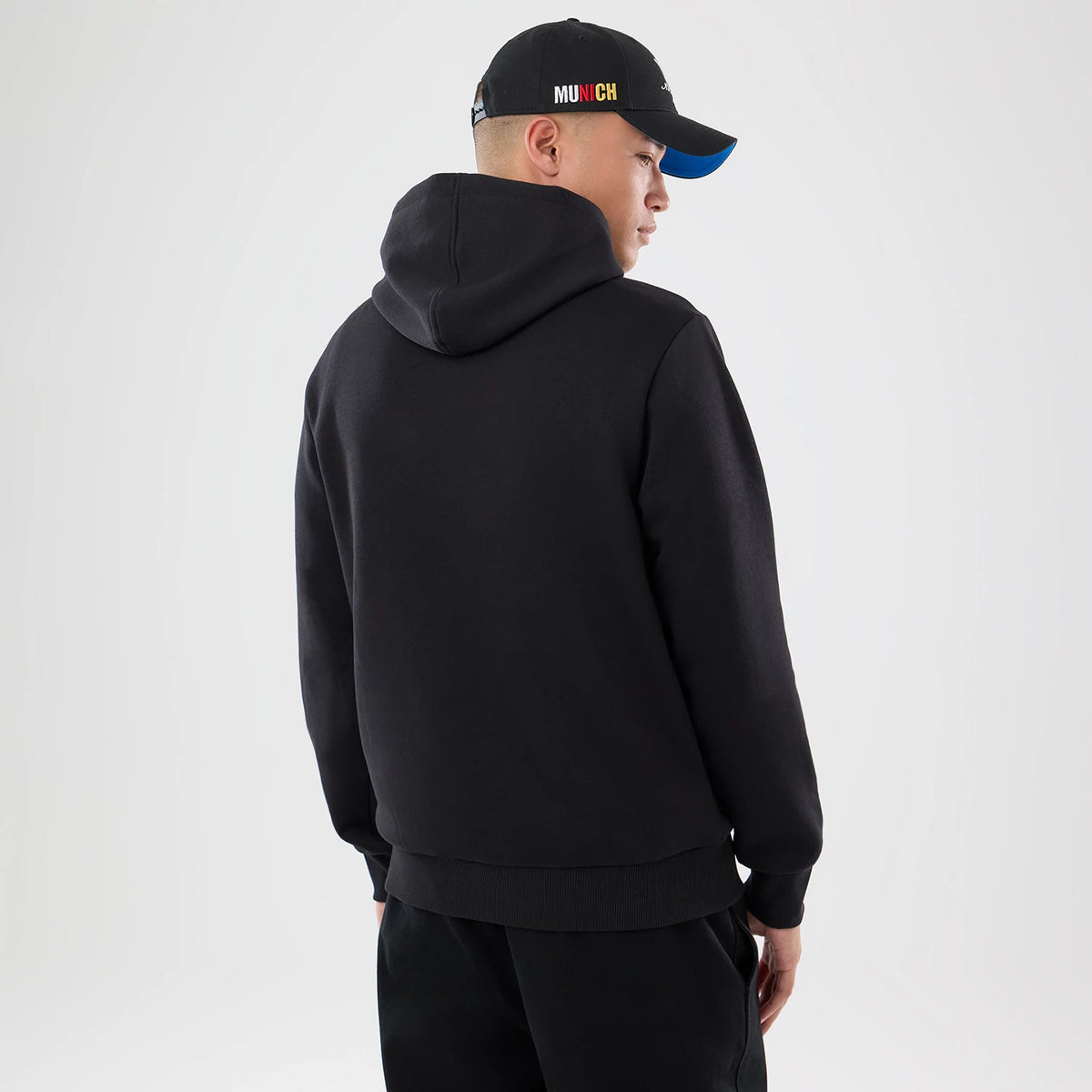 The model is wearing this NFL Patch Detroit Lions Pullover Hoodie in black. 2