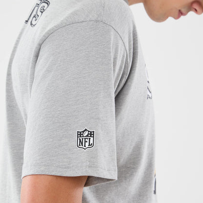 The model is wearing this NFL Graphic Slogan New Orleans Saints Oversized T-Shirt in grey. 4