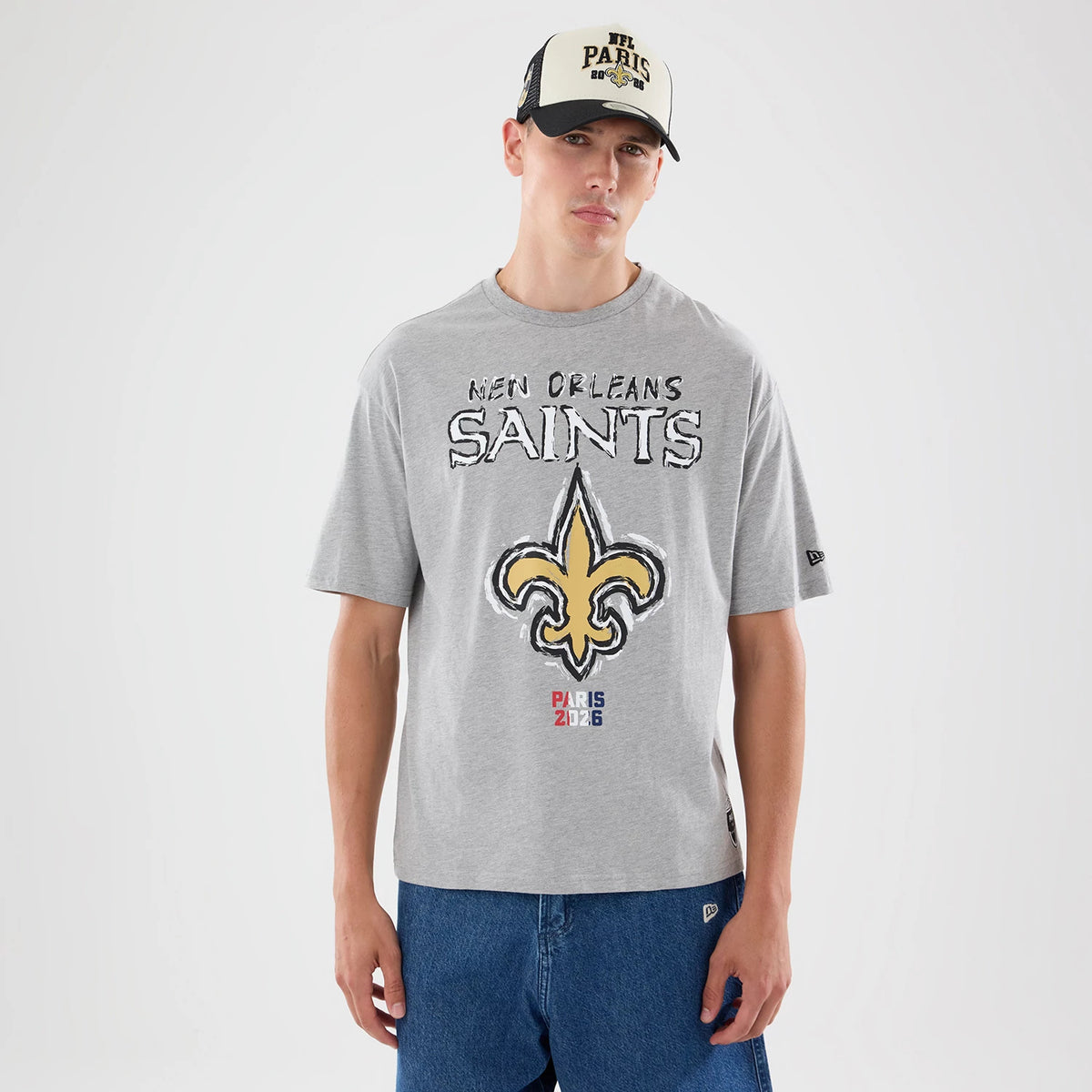 The model is wearing this NFL Graphic Slogan New Orleans Saints Oversized T-Shirt in grey. 1