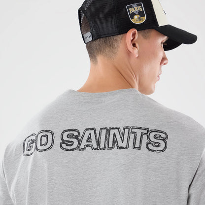 The model is wearing this NFL Graphic Slogan New Orleans Saints Oversized T-Shirt in grey. 7