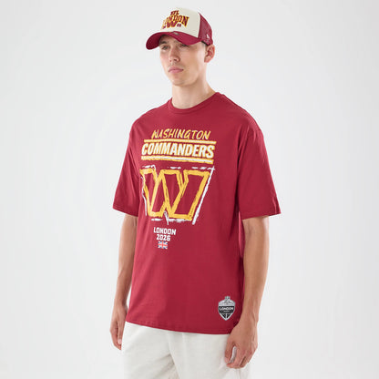 New Era Washington Commanders NFL Graphic Slogan Dark Red Oversized T-Shirt, front view on a model wearing a matching cap, featuring Washington Commanders text with a large W emblem, London 2023 lettering and a small London shield logo near the hem.