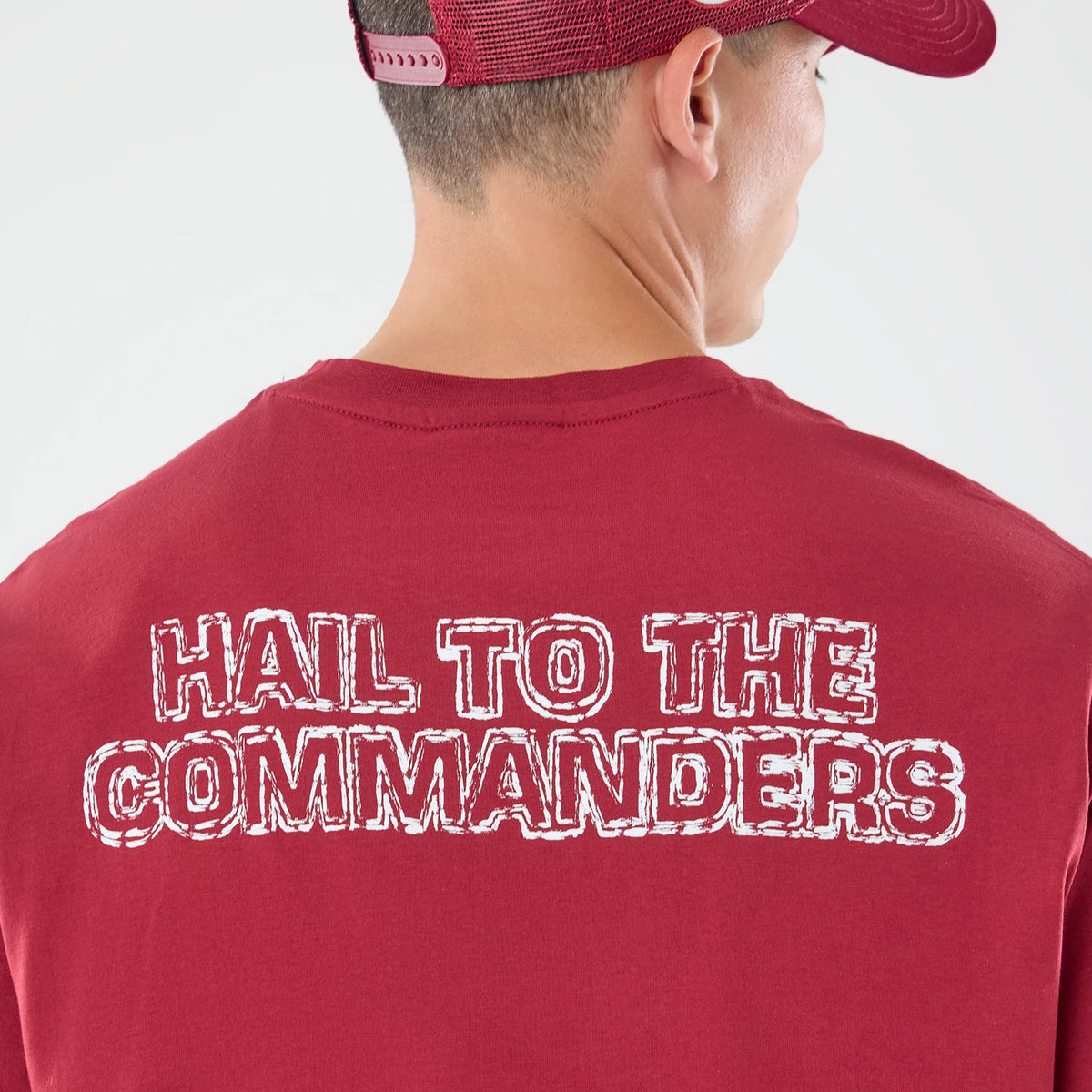 The model is wearing this NFL Graphic Slogan Washington Commanders Oversized T-Shirt in dark red. 7