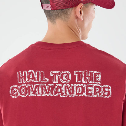 The model is wearing this NFL Graphic Slogan Washington Commanders Oversized T-Shirt in dark red. 7