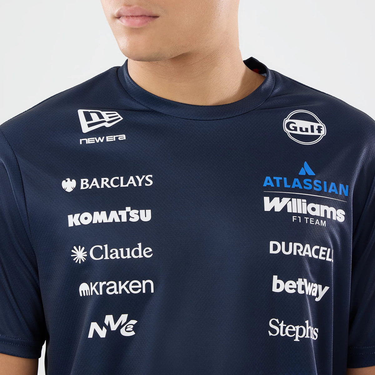 The model is wearing this Singapore Williams Tech T-Shirt in navy. 3