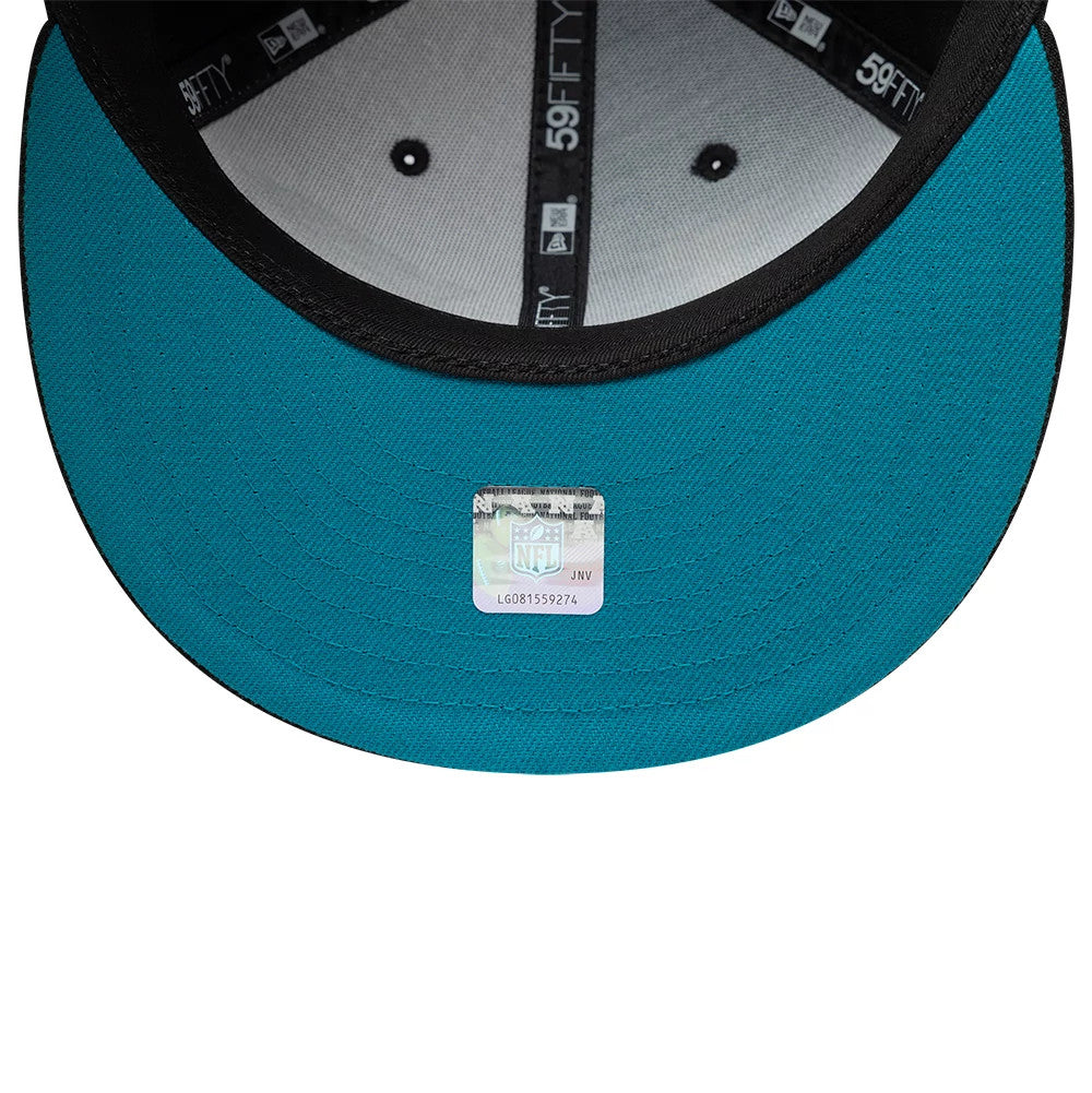 Pictured is this NFL International Games Jacksonville Jaguars 59FIFTY Fitted cap in black. 7
