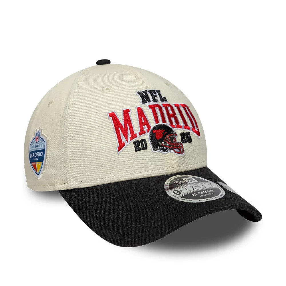 Falcons NFL International Games 2026 Madrid White & Black New Era 9FORTY M-Crown Adjustable Cap, front view showing the raised red and black NFL Madrid 2026 embroidery on the structured white crown, with a black curved visor.