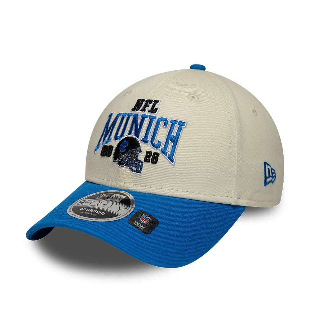 Pictured is this NFL International Games 2026 Munich Detroit Lions 9FORTY M-Crown cap in white & blue. 3