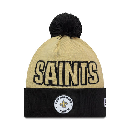 Pictured is this NFL International Games 2026 Paris New Orleans Saints Cuff Knit Beanie hat in light beige. 1