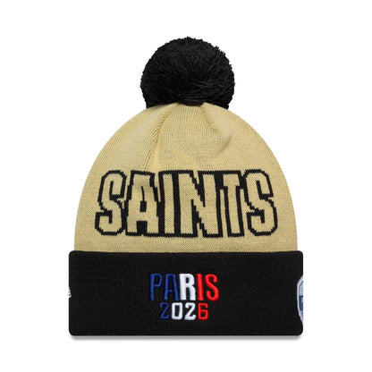Pictured is this NFL International Series Games 2026 Paris New Orleans Saints Cuff Knit Beanie hat in light beige. 2