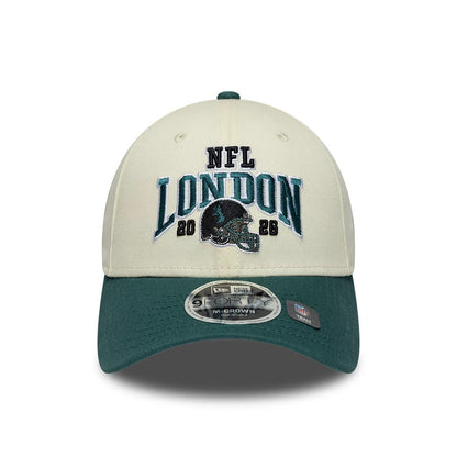 Pictured is this NFL International Games 2026 London Philadelphia Eagles 9FORTY M-Crown cap in white & dark green. 2