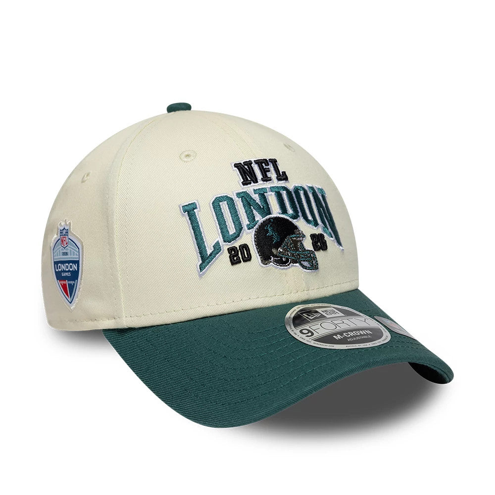 Pictured is this NFL International Games 2026 London Philadelphia Eagles 9FORTY M-Crown cap in white & dark green. 1