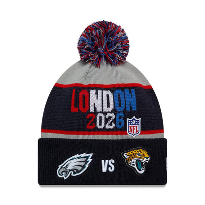 Pictured is this NFL International Games 2026 London Philadelphia Eagles VS Jacksonville Jaguars Dueling Logos Cuff Knit Beanie hat in navy. 1