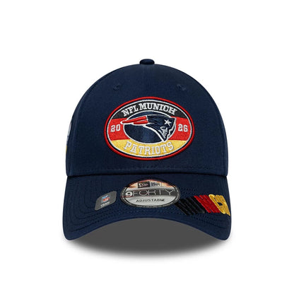 Pictured is this NFL International Series Games 2026 Munich New England Patriots 9FORTY cap in dark blue. 2
