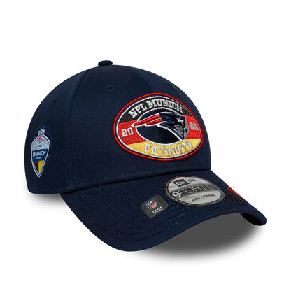 Pictured is this NFL International Games 2026 Munich New England Patriots 9FORTY cap in dark blue. 1