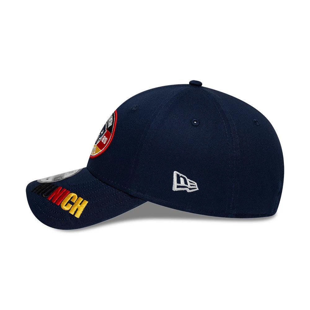 Pictured is this NFL International Games 2026 Munich New England Patriots 9FORTY cap in dark blue. 4
