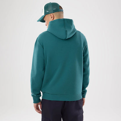 The model is wearing this NFL International Series Games 2026 Philadelphia Eagles Pullover Hoodie in dark green. 2