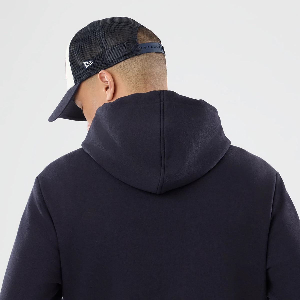 The model is wearing this NFL International Series Games 2026 Houston Texans Pullover Hoodie in navy. 7
